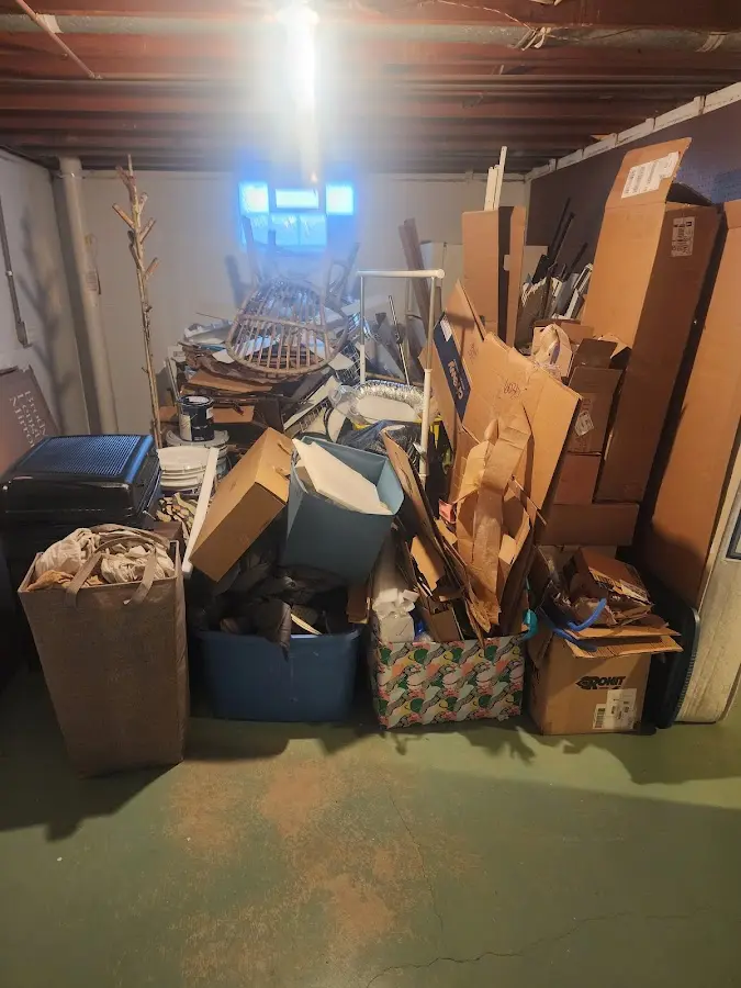 Roll-off dumpster container at job site for Yard Waste Dumpster Rental in Urbandale